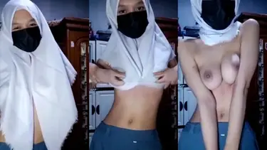 Nina Asanti Jilbab Seragam Batik Aksi Ranjang poster